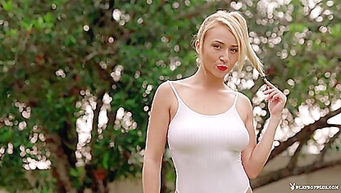 Playgirl with a hot body has huge boobs in outdoor play