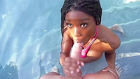Brunette ebony babe has sex in pool and takes a big cum shot