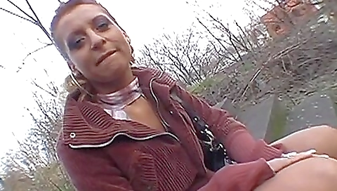 A big ass girl is riding her man in the backyard outdoors