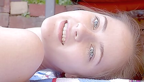 Beautiful brunette with sexy sunglasses enjoys outdoor