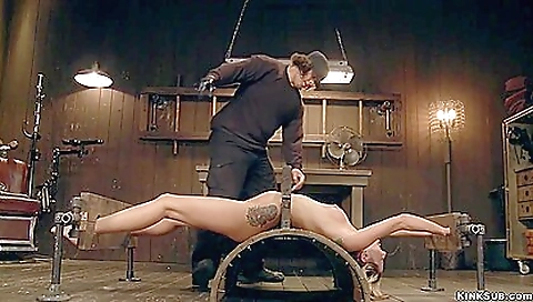 Hot blonde with a gas mask gets ass fucked by a dick and a dildo